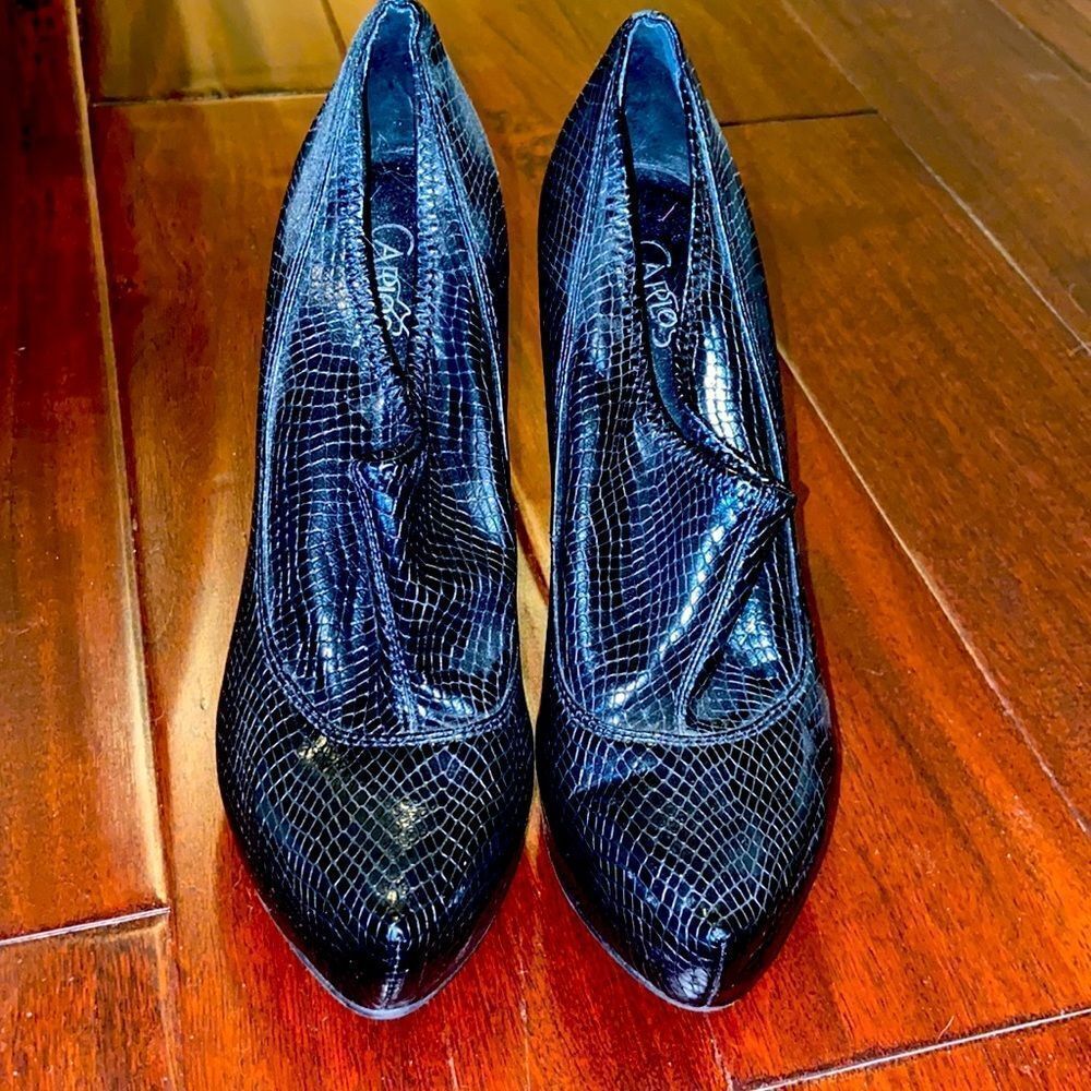 Black snakeskin platform heels